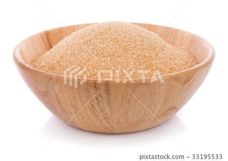 Brown sugar in wooden bolw isolated on white Brown sugar in wooden bolw isolated on white 33195533