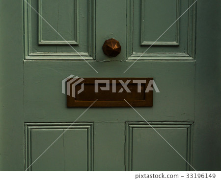 Old letterbox in the door 33196149