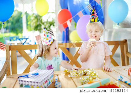 Little boy and girl celebrate birthday party Little boy and girl celebrate birthday party 33198124
