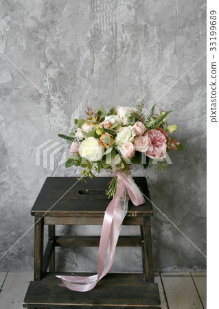 Spring bouquet of mixed flowers on vintage gray Spring bouquet of mixed flowers on vintage gray 33199689