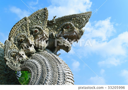 Serpent or naga statue head 33205996