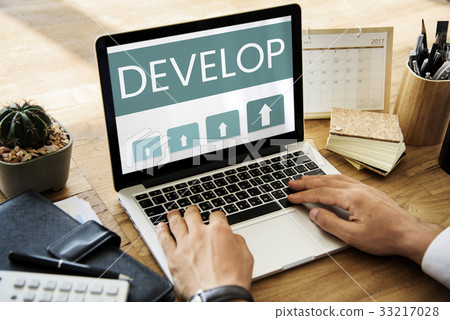 Hands working on laptop network graphic overlay Hands working on laptop network graphic overlay 33217028
