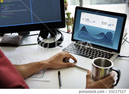 Hand working on laptop network graphic overlay Hand working on laptop network graphic overlay 33217527