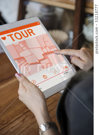 Hands working on digital device network graphic overlay 33218777