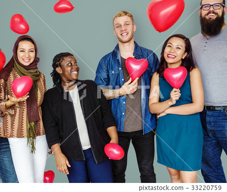 Group of Diverse People Holding Heart Balloons Cheerfully 33220759