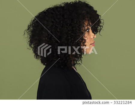 African girl casual studio portrait in side view 33221284