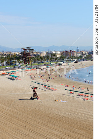 The tourists enjoiying their vacation on beach The tourists enjoiying their vacation on beach 33221784