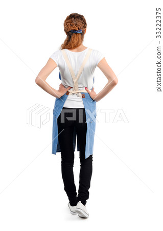 Young redhaired woman chef or waiter posing 33222375