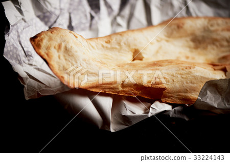 Georgian bread baked in clay oven . Shotis Puri Georgian bread baked in clay oven . Shotis Puri 33224143