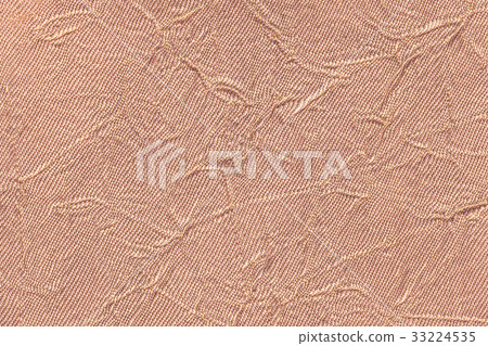 Light brown wavy background from textile material Light brown wavy background from textile material 33224535