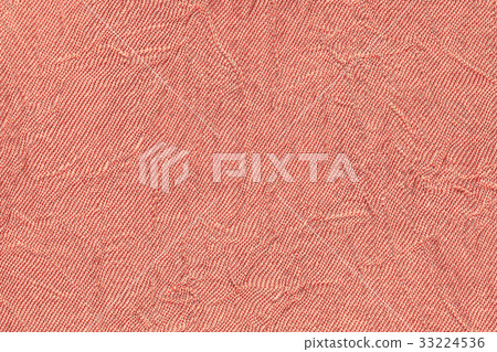Light red wavy background from a textile material. Light red wavy background from a textile material. 33224536