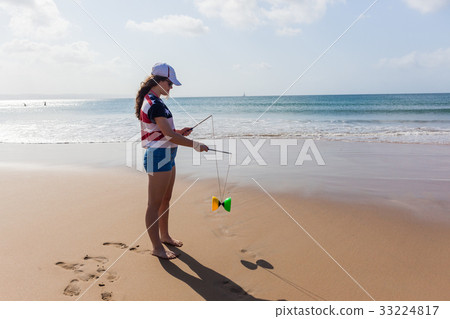 Teen Girl  Beach Spinning Disks 33224817