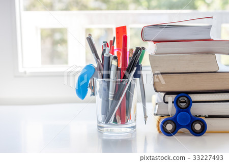 work desk with stationery books work desk with stationery books 33227493
