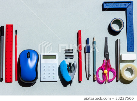 school stationery on blue paper background 33227500