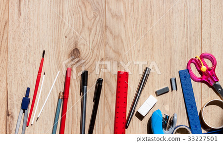 school stationery on woden background school stationery on woden background 33227501