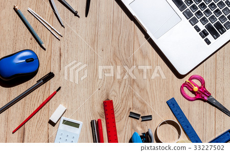 school stationery on blue paper background school stationery on blue paper background 33227502