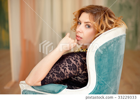 Image of elegant girl sitting in retro style 33229333