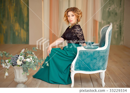 Image of elegant girl sitting in retro style 33229334