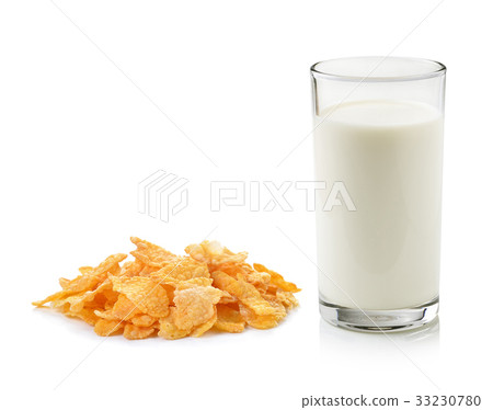 Cornflakes and glass of milk on white background. Cornflakes and glass of milk on white background. 33230780