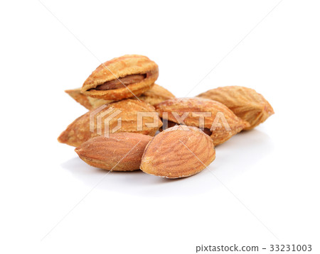 Almonds on a white background Almonds on a white background 33231003