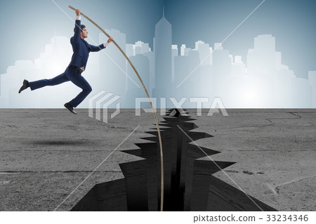 Businessman in pole vaulting concept 33234346