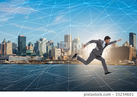 Businessman running in internet of things concept 33234601