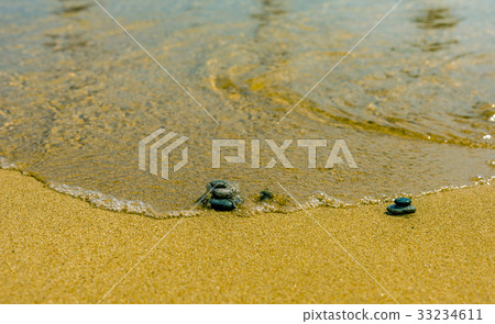 Balance stone on river coast Balance stone on river coast 33234611