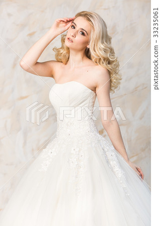 fashionable gown, beautiful blonde model, bride 33235061
