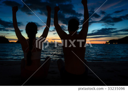 Young couple feeling happy and free during summer 33235096