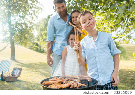 Portrait of happy family with two children Portrait of happy family with two children 33235099
