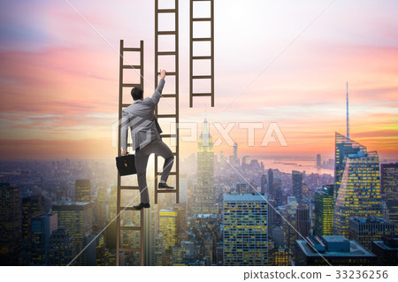 Businessman climbing career ladder in business Businessman climbing career ladder in business 33236256