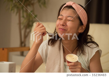 Woman eating ice cream Woman eating ice cream 33236483