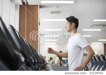 Men running in the gym Men running in the gym 33236491