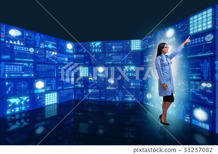 Doctor in telemedicine concept pressing buttons Doctor in telemedicine concept pressing buttons 33237082