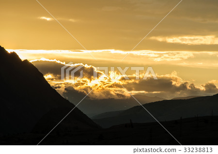 Scenic sunset and sunrise in mountainous region 33238813