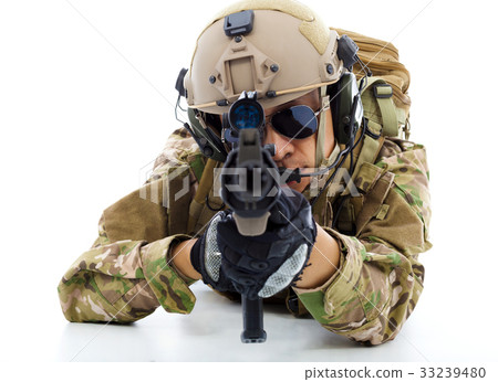 Soldier with rifle and lying on floor over white  33239480