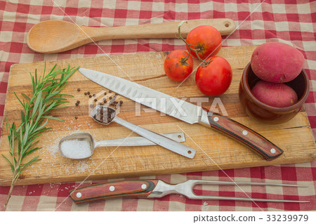 knife and cutting board with fresh vegetables meal knife and cutting board with fresh vegetables meal 33239979