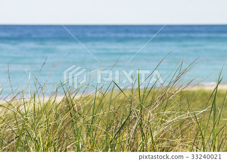 Aqua blur waters in warm summer michigan Aqua blur waters in warm summer michigan 33240021
