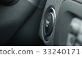 Macro engine start and stop button of a car. 33240171