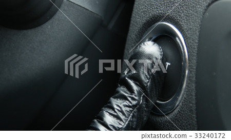 Macro engine start and stop button of a car. 33240172