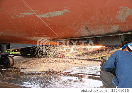 Oxy-Acetylene torch cutting through steel hull Oxy-Acetylene torch cutting through steel hull 33241016