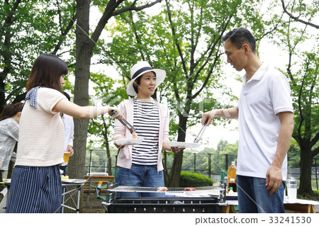 Friends who enjoy outdoor BBQ BBQ 33241530
