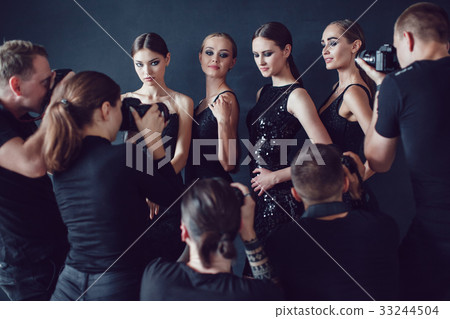 Photographers paparazzi take photos of women in Photographers paparazzi take photos of women in 33244504