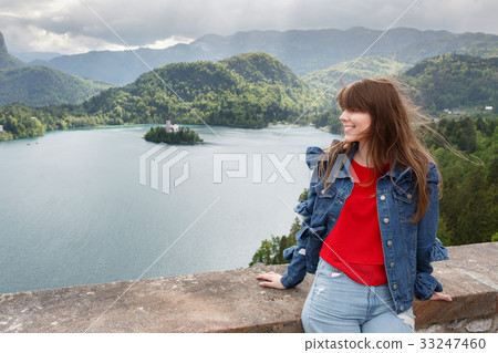 the girl looks at the mountain views. valley view 33247460