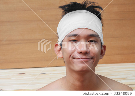 Young man with trauma of head by Medical bandage  33248099