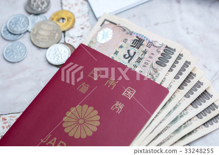 Japanese passport with Japanese notes and coins 33248255