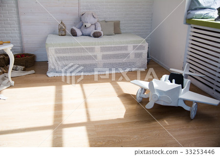 Wooden toy airplane on the floor 33253446