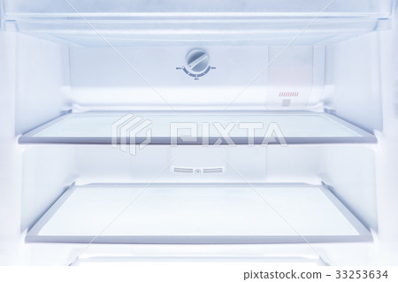 inside of clean and empty refrigerator with shelve inside of clean and empty refrigerator with shelve 33253634