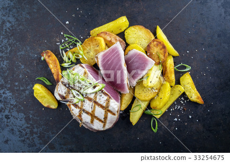 Tuna Steak with Fried Potatoes Tuna Steak with Fried Potatoes 33254675