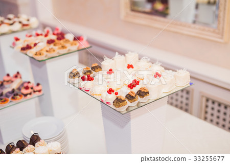 Different kinds of baked sweets on a buffet 33255677